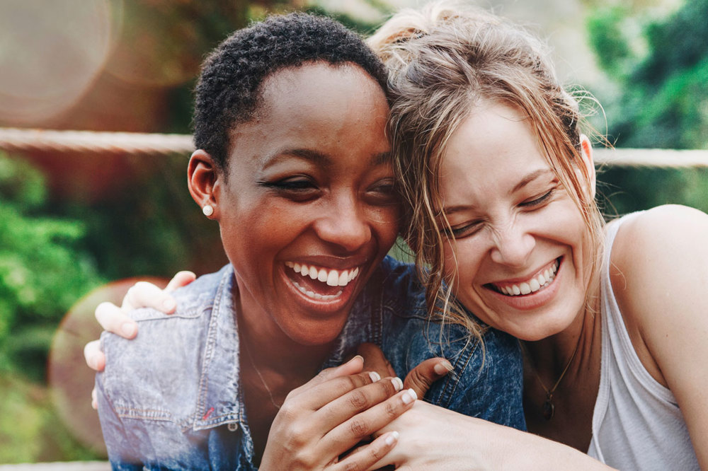 Two women hugging