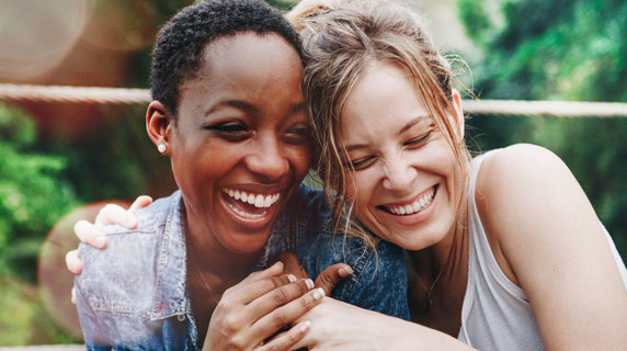 Two women hugging